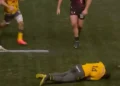 England international knocked out cold by swinging arm as medics rush to his aid